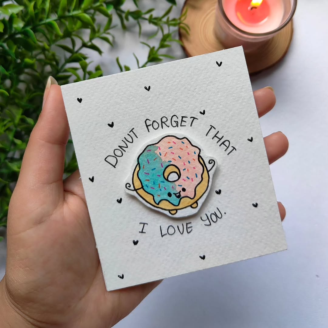 Handmade 3D Donut Pun Card featuring a hand-painted donut sticker and the text Donut Forget That I Love You on 300 GSM cardstock.
