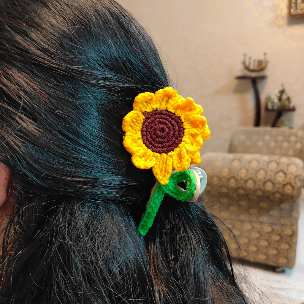 Handmade yellow crochet sunflower hair claw clip by Art Cart by Swati.