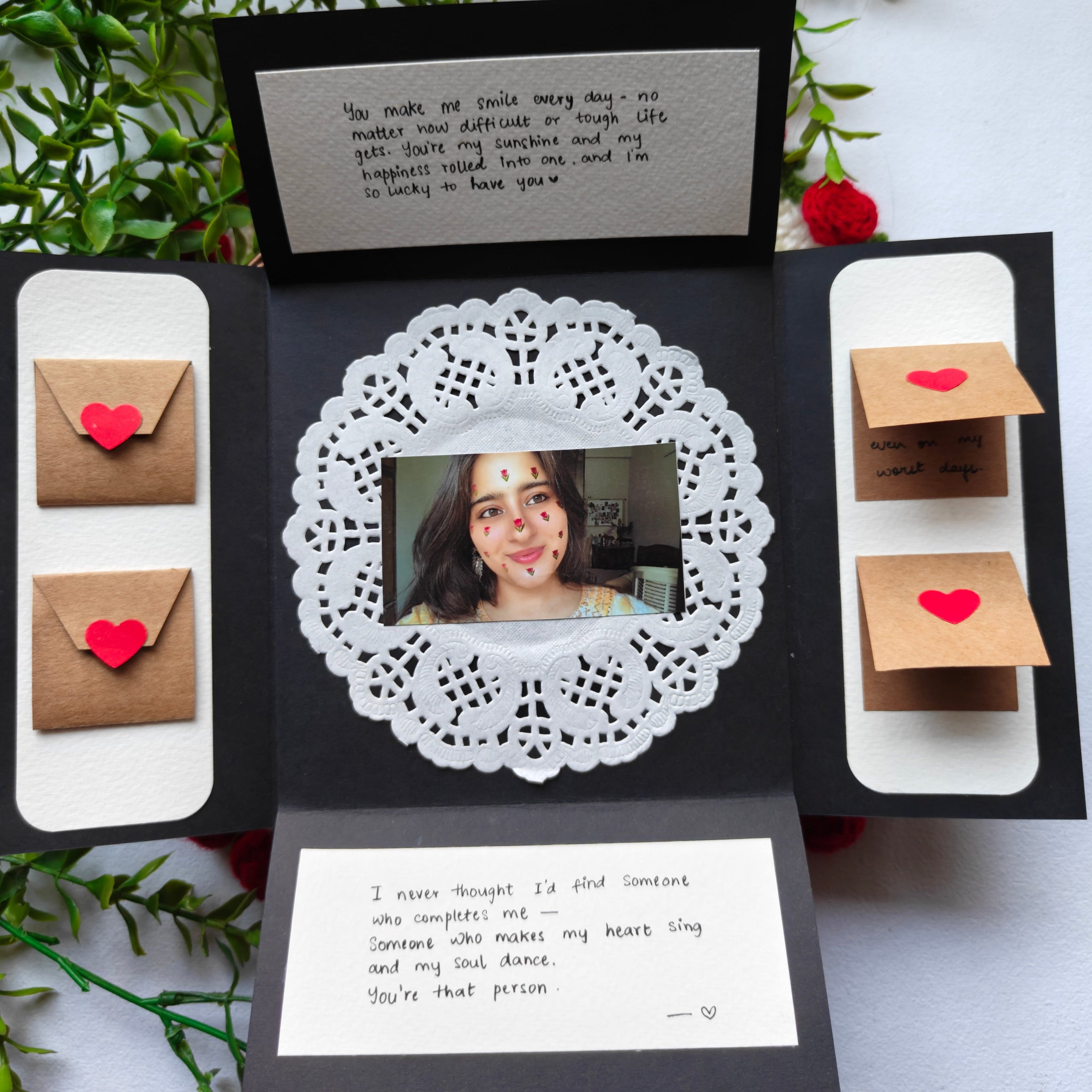 Inside layout of a personalized creative card showing slots for custom photos and handwritten romantic messages.