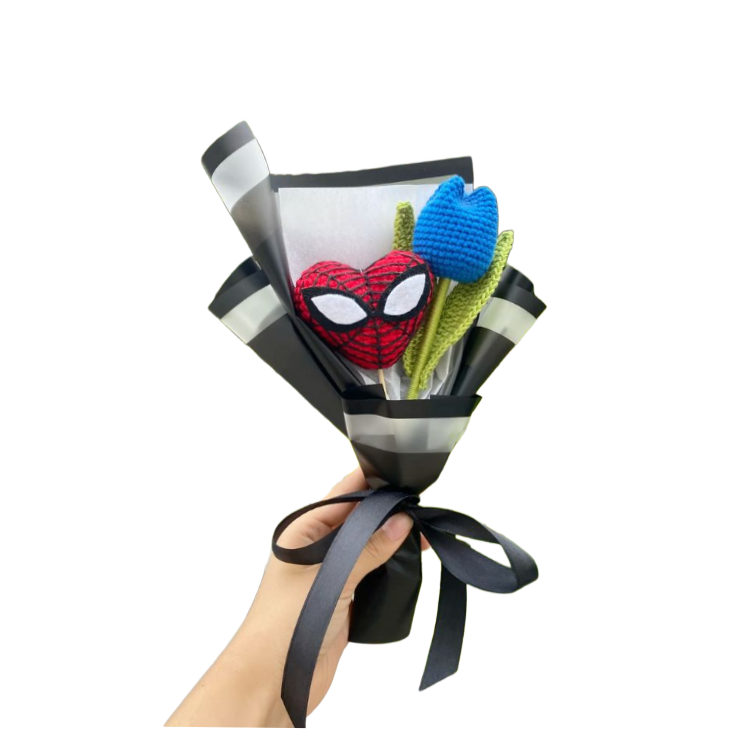 Handmade crochet bouquet featuring a Spiderman amigurumi figure and a red crochet tulip wrapped in premium craft paper