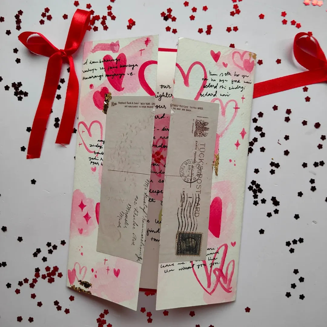 Close-up of hand-painted watercolour heart showing artistic brush strokes and premium paper texture.