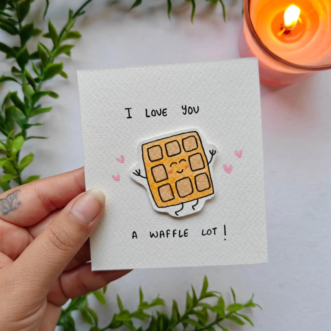 Handmade 3D pun card featuring a cute waffle illustration and the text 'I love you a waffle lot' on 300 GSM white cardstock