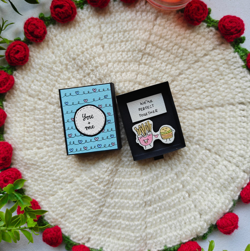 Handmade personalised matchbox gift with "You & Me" text on a white background, perfect for anniversary gifts.